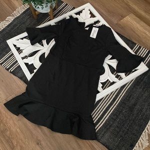 Brand new with tags little black dress from Meaneor. Size large.
